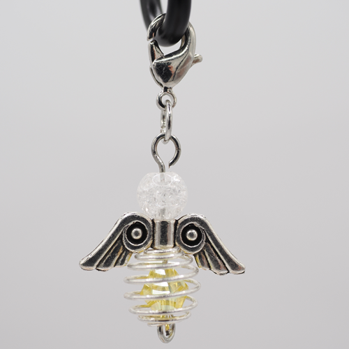 Schutzengel mit Spiralkugel gelb