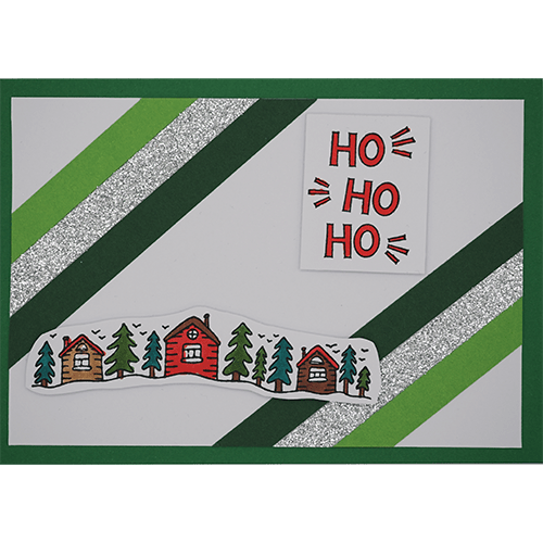 Weihnachtskarte mit Häusern im Wald dunkelgrün