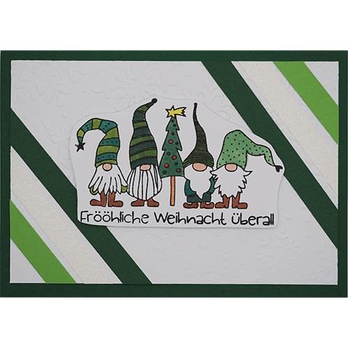 Weihnachtskarte mit vier Wichteln und Tannenbaum grün